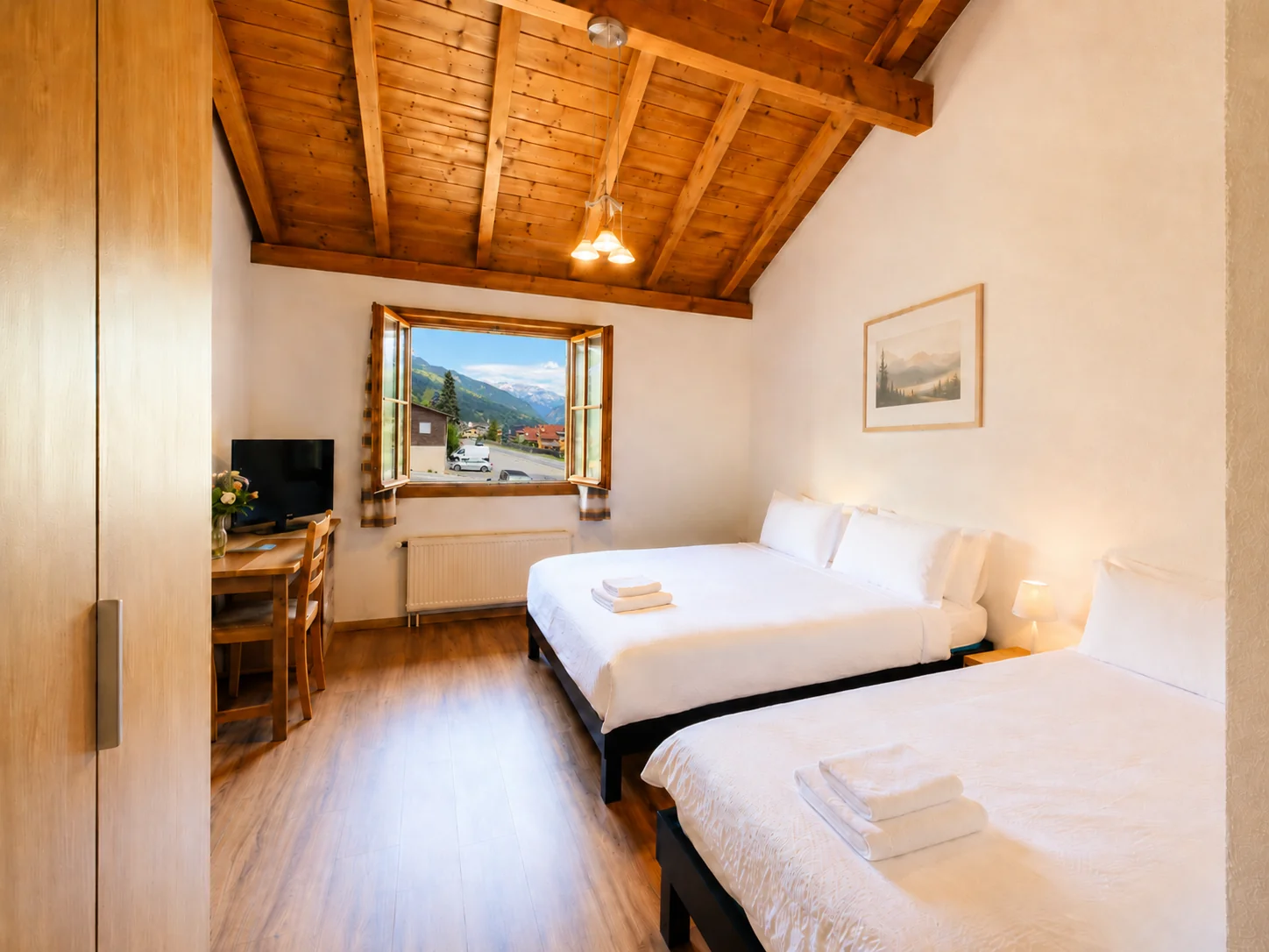 Dreibettzimmer mit Bergblick